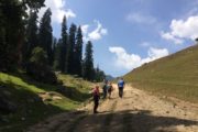 Kashmir trip budget - people hiking in Sonmarg